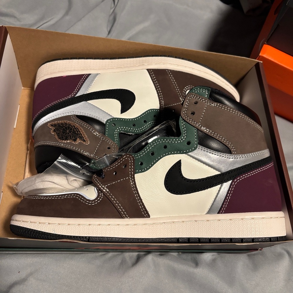 Brand new, never worn. Air Jordan One Retro hi tops